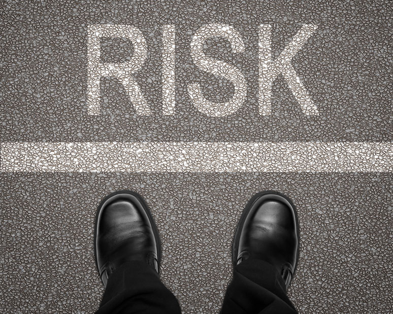 Man looking across the line at risk - Risk Management Principles