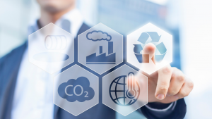 A man selecting the sustainability icon from a option of icons such as CO2 emissions, climate change, pollution and oil spill.